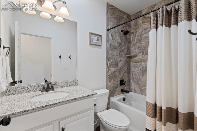 full bathroom with vanity, toilet, and shower / bath combo with shower curtain