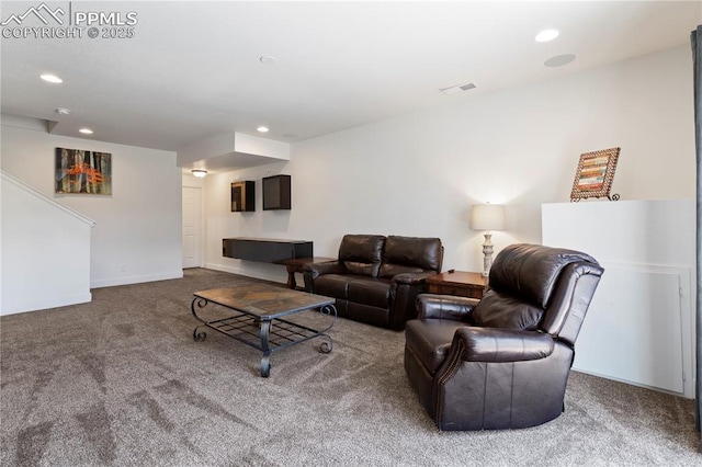 living room with carpet and recessed lighting
