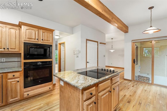 1433 Ledge Rock Ter, Colorado Springs, CO 80919 - kitchen featuring black appliances, light wood finished floors, beamed ceiling, light stone counters, and decorative light fixtures