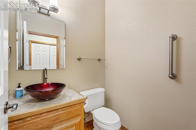 1433 Ledge Rock Ter, Colorado Springs, CO 80919 - half bath with vanity and toilet