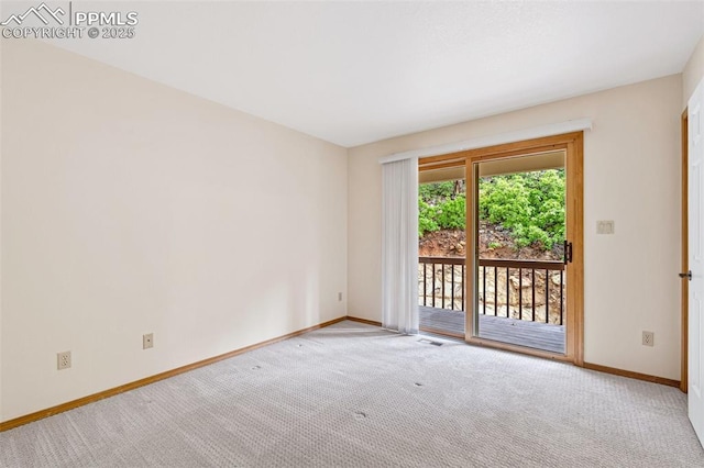 1433 Ledge Rock Ter, Colorado Springs, CO 80919 - spare room featuring carpet flooring and baseboards
