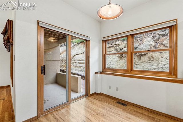 1433 Ledge Rock Ter, Colorado Springs, CO 80919 - unfurnished room featuring light wood-style floors and baseboards