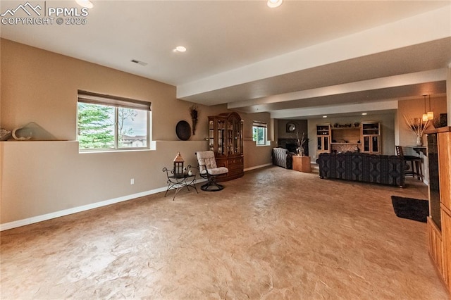 12250 Smoke Bluffs Rd, Peyton, CO 80831 - living room with baseboards, plenty of natural light, recessed lighting, and carpet floors