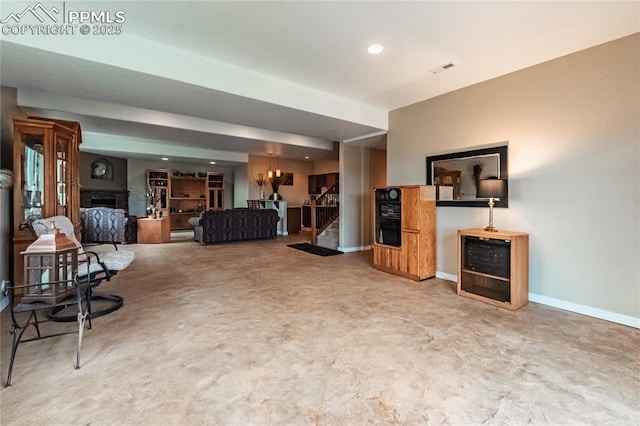 12250 Smoke Bluffs Rd, Peyton, CO 80831 - living room with stairway, a fireplace, baseboards, and recessed lighting