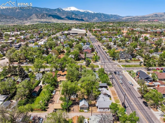 825 N Wahsatch Ave, Colorado Springs, CO 80903 - aerial overview of property's location featuring a mountain backdrop and nearby suburban area