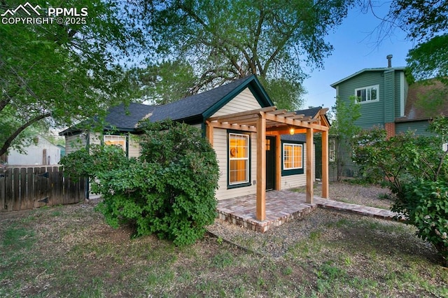 825 N Wahsatch Ave, Colorado Springs, CO 80903 - rear view of property featuring a pergola, a patio area, and a fenced backyard
