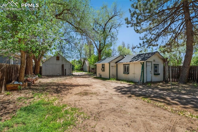 825 N Wahsatch Ave, Colorado Springs, CO 80903 - exterior space featuring fence and an outdoor structure
