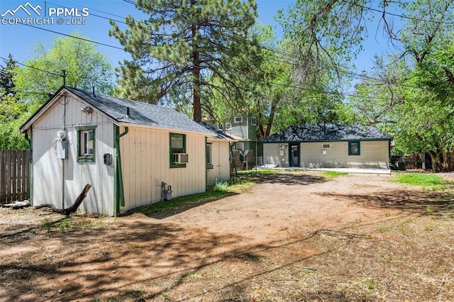 825 N Wahsatch Ave, Colorado Springs, CO 80903 - view of outdoor structure featuring fence, an outdoor structure, and cooling unit