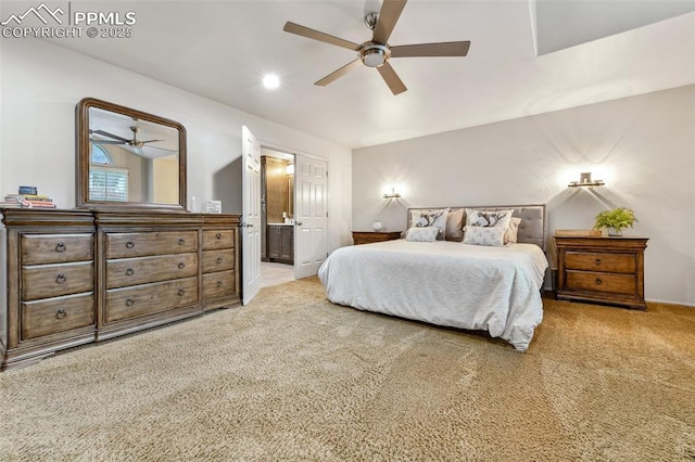8005 Hedgewood Way, Colorado Springs, CO 80919 - bedroom with carpet, connected bathroom, and ceiling fan