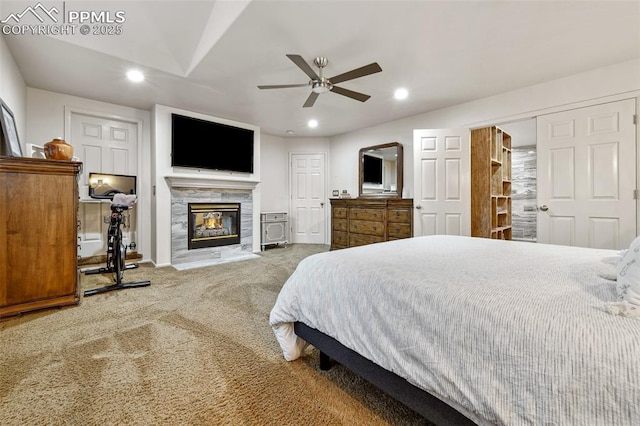 8005 Hedgewood Way, Colorado Springs, CO 80919 - bedroom with carpet floors, recessed lighting, a fireplace, and ceiling fan