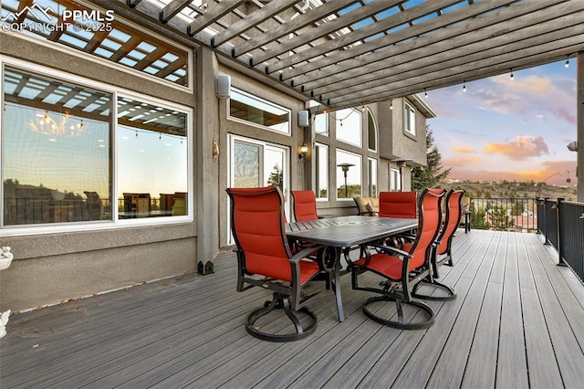 8005 Hedgewood Way, Colorado Springs, CO 80919 - deck at dusk with a pergola and outdoor dining space