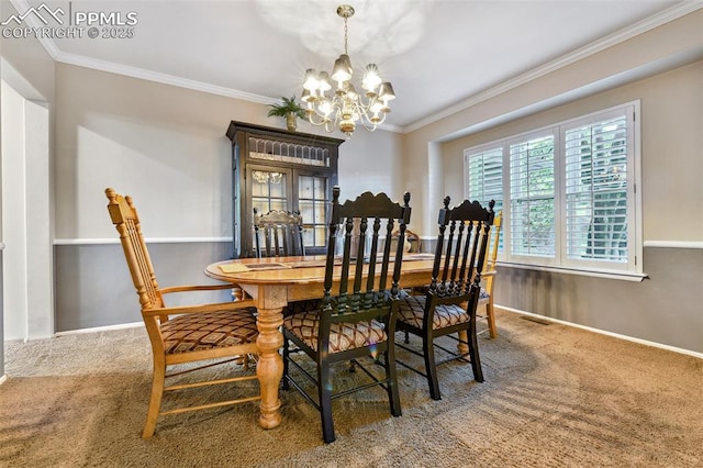 8005 Hedgewood Way, Colorado Springs, CO 80919 - dining area featuring carpet flooring, a chandelier, ornamental molding, and baseboards