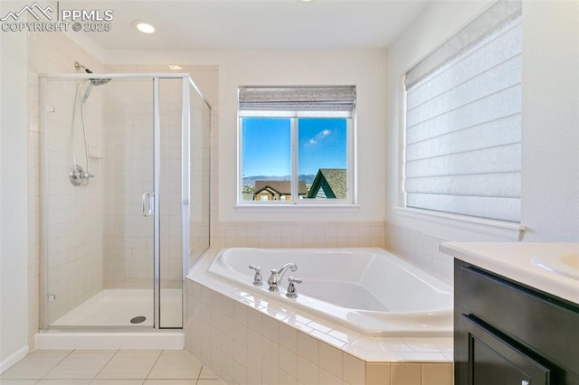 full bath featuring a shower stall, a bath, plenty of natural light, and vanity