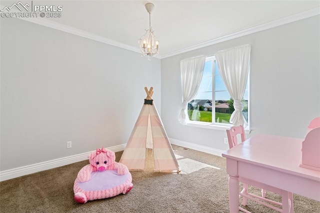 playroom featuring crown molding, a chandelier, carpet flooring, and baseboards