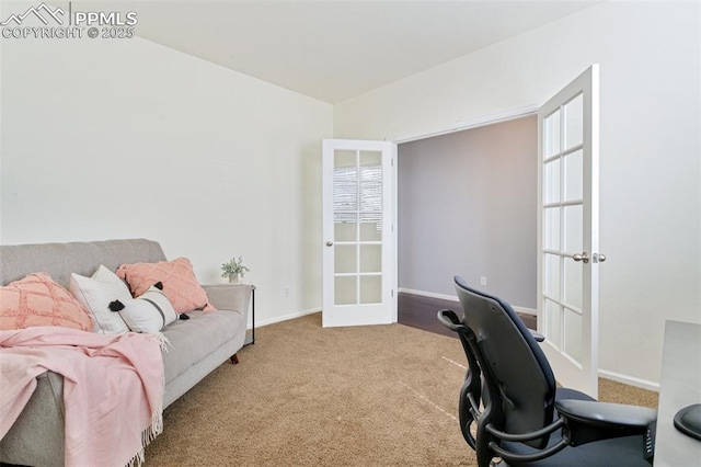 office space with carpet floors, baseboards, and french doors