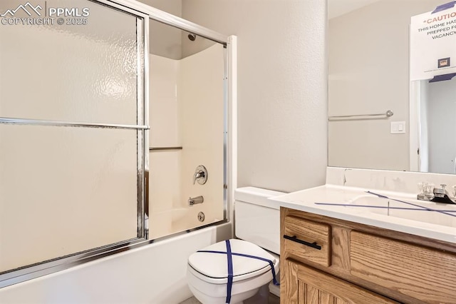 2068 Silkwood Dr, Colorado Springs, CO 80920 - bathroom featuring toilet, vanity, and enclosed tub / shower combo