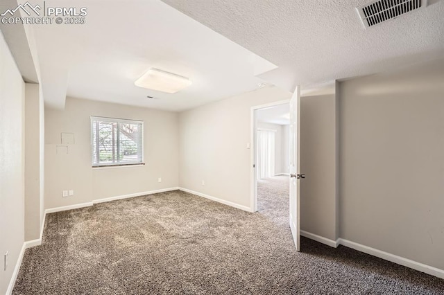 2068 Silkwood Dr, Colorado Springs, CO 80920 - spare room with carpet flooring, baseboards, and a textured ceiling