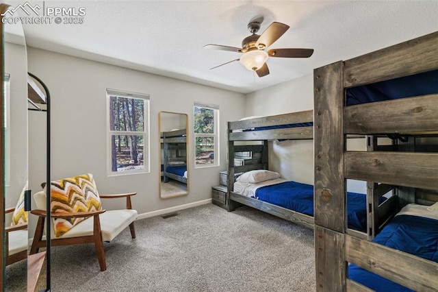 6940 Franciville Rd, Colorado Springs, CO 80908 - carpeted bedroom with baseboards and a ceiling fan
