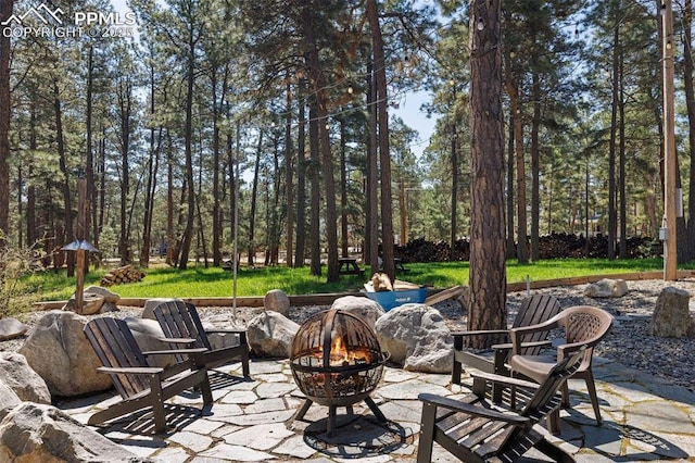 6940 Franciville Rd, Colorado Springs, CO 80908 - view of patio with a fire pit