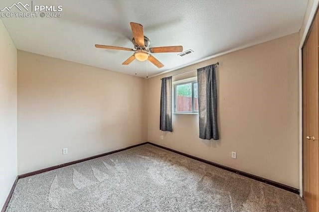780 Foxwood Dr, Colorado Springs, CO 80911 - carpeted empty room featuring baseboards and a ceiling fan