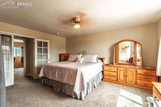 780 Foxwood Dr, Colorado Springs, CO 80911 - bedroom with light colored carpet and ceiling fan