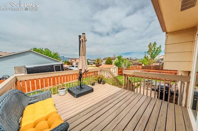 780 Foxwood Dr, Colorado Springs, CO 80911 - deck with a storage shed, an outdoor structure, and a fenced backyard