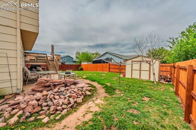 780 Foxwood Dr, Colorado Springs, CO 80911 - view of yard with a storage shed, an outdoor structure, stairs, and a patio