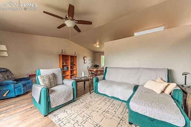 780 Foxwood Dr, Colorado Springs, CO 80911 - living area featuring ceiling fan, wood finished floors, and vaulted ceiling