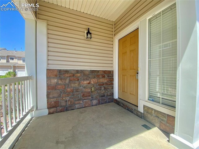 7513 Sandy Springs Pt, Fountain, CO 80817 - entrance to property with a porch
