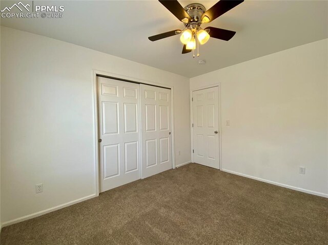 7513 Sandy Springs Pt, Fountain, CO 80817 - unfurnished bedroom featuring carpet flooring, baseboards, a closet, and ceiling fan