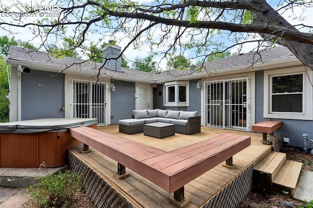 603 Three Eagles St, Colorado Springs, CO 80905 - wooden deck featuring a hot tub and an outdoor living space