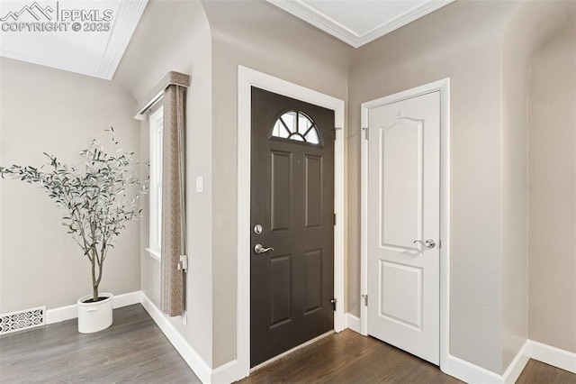603 Three Eagles St, Colorado Springs, CO 80905 - foyer with dark wood-style flooring, ornamental molding, and baseboards