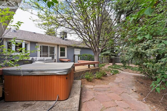 603 Three Eagles St, Colorado Springs, CO 80905 - view of patio / terrace with a hot tub