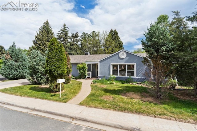 603 Three Eagles St, Colorado Springs, CO 80905 - ranch-style home with a front lawn and stucco siding