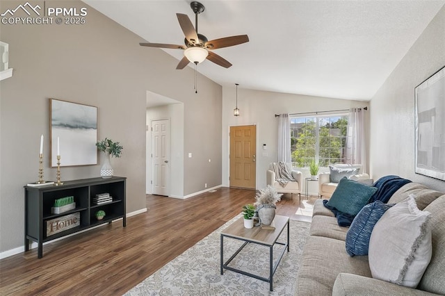 8463 Shadow Run Ln, Fountain, CO 80817 - living room featuring wood finished floors, ceiling fan, high vaulted ceiling, and baseboards