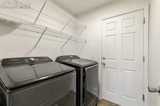 8463 Shadow Run Ln, Fountain, CO 80817 - washroom with washer and clothes dryer