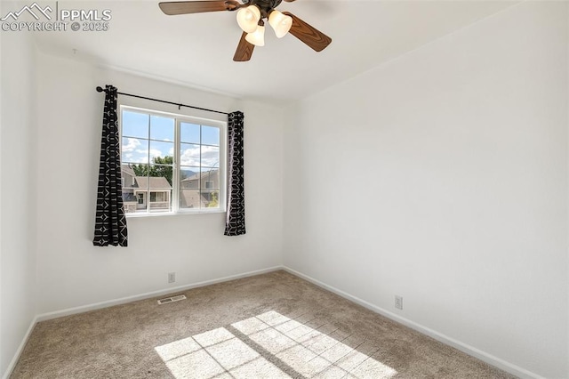 8463 Shadow Run Ln, Fountain, CO 80817 - unfurnished room with carpet floors, ceiling fan, and baseboards