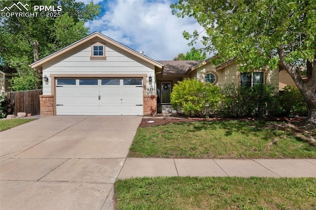 629 Golden Eagle Dr, Colorado Springs, CO 80916 - ranch-style home featuring brick siding, driveway, and a garage