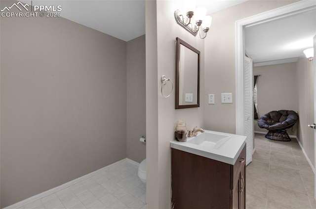 629 Golden Eagle Dr, Colorado Springs, CO 80916 - bathroom featuring vanity, toilet, tile patterned floors, and baseboards