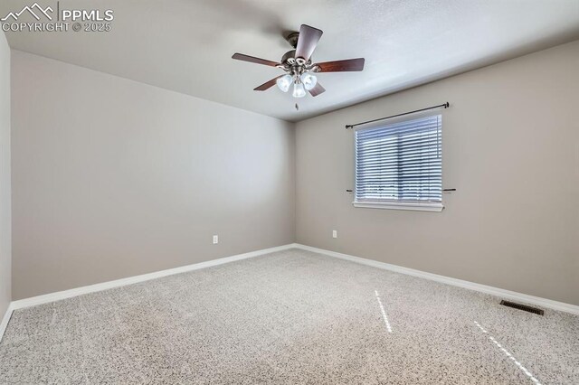 8883 White Prairie Vw, Colorado Springs, CO 80924 - unfurnished room with a ceiling fan and baseboards
