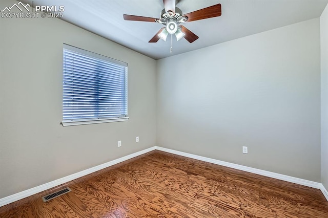 8883 White Prairie Vw, Colorado Springs, CO 80924 - empty room featuring wood finished floors, baseboards, and a ceiling fan