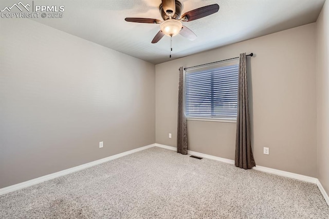 8883 White Prairie Vw, Colorado Springs, CO 80924 - empty room featuring a ceiling fan, carpet floors, and baseboards