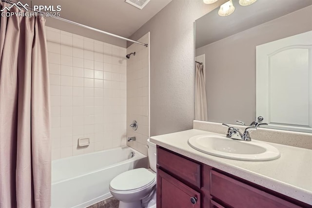 8883 White Prairie Vw, Colorado Springs, CO 80924 - full bath featuring a textured wall, vanity, toilet, and shower / bath combo with shower curtain