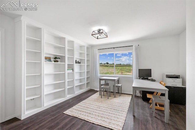 office with wood finished floors and baseboards