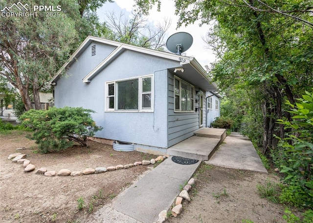 909 E Costilla St, Colorado Springs, CO 80903 - view of property exterior with stucco siding