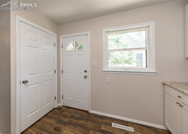 909 E Costilla St, Colorado Springs, CO 80903 - foyer with dark wood finished floors and baseboards