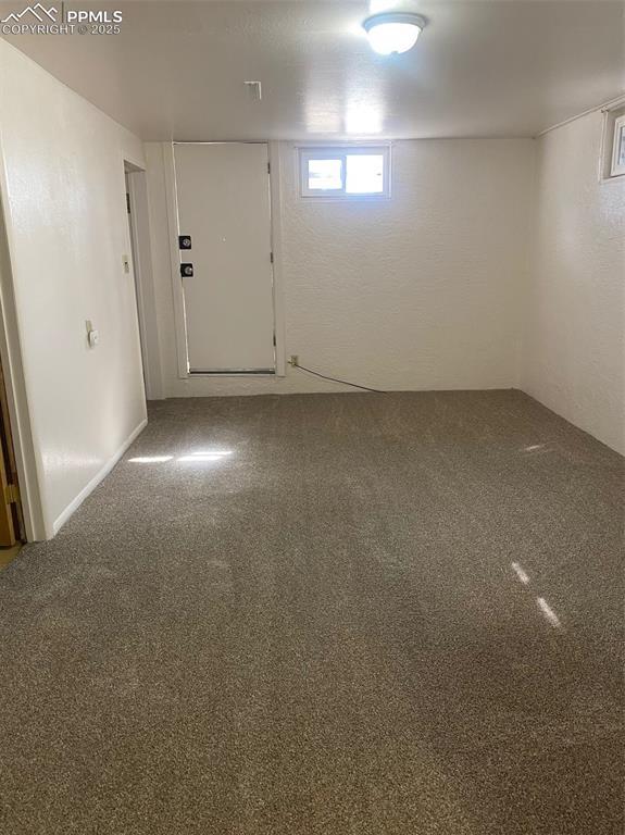 909 E Costilla St, Colorado Springs, CO 80903 - below grade area featuring carpet flooring