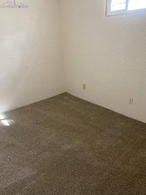 909 E Costilla St, Colorado Springs, CO 80903 - view of carpeted empty room