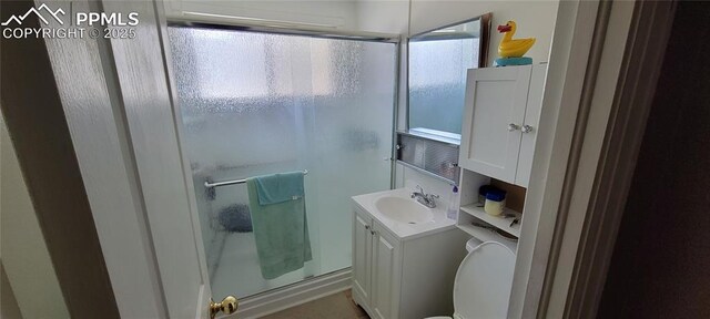 2510 N Union Blvd, Colorado Springs, CO 80909 - bathroom featuring a shower stall, vanity, and toilet