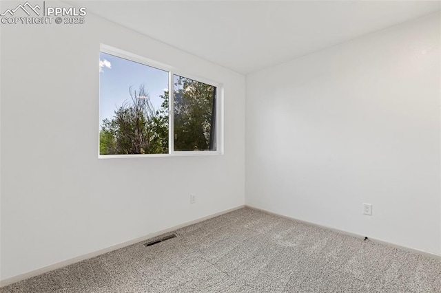 2115 Friendship Cir, Colorado Springs, CO 80904 - carpeted empty room featuring baseboards